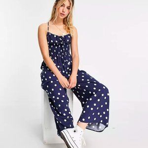 Navy Tie front shirred waist culotte jumpsuit in navy & white polka dot print